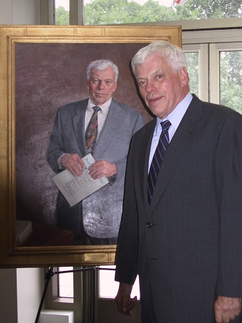 Dr McDonald is pictured with his official portrait which is displayed in ACPs Philadelphia headquarters